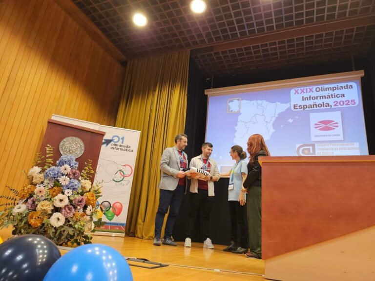 Imagen del relevo de la organización de la Olimpiada Informática Española